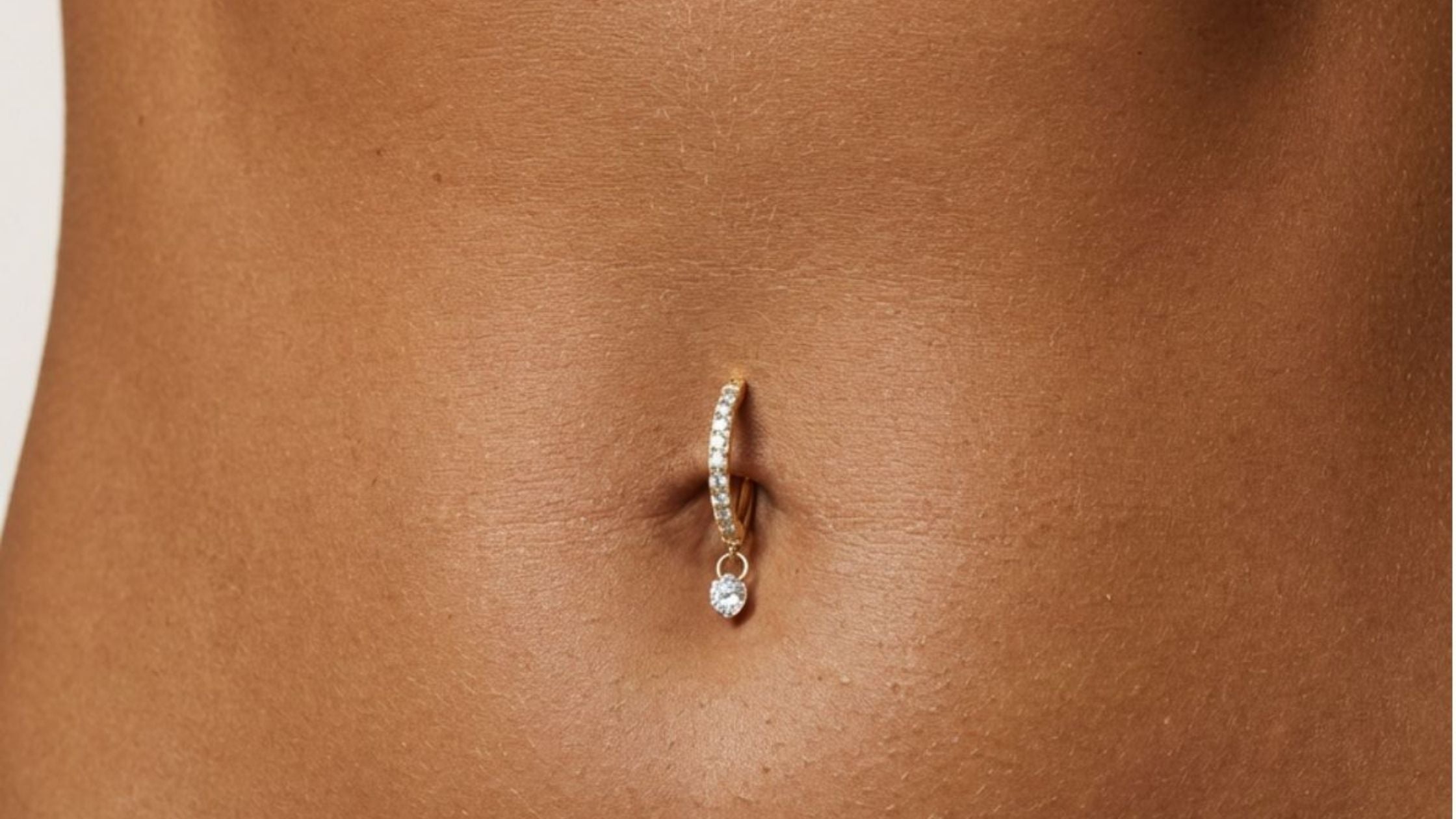 Infection au piercing au nombril : causes, symptômes et solutions