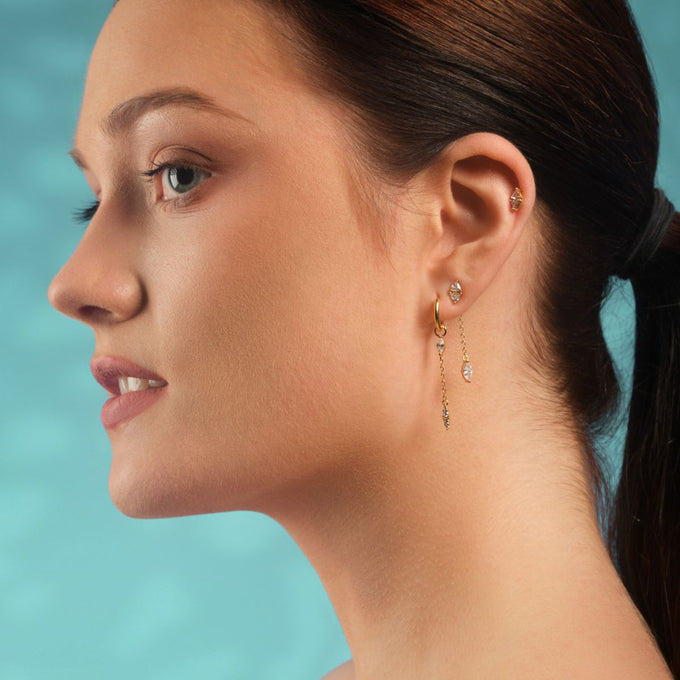 Piercing Ella - vita stenar