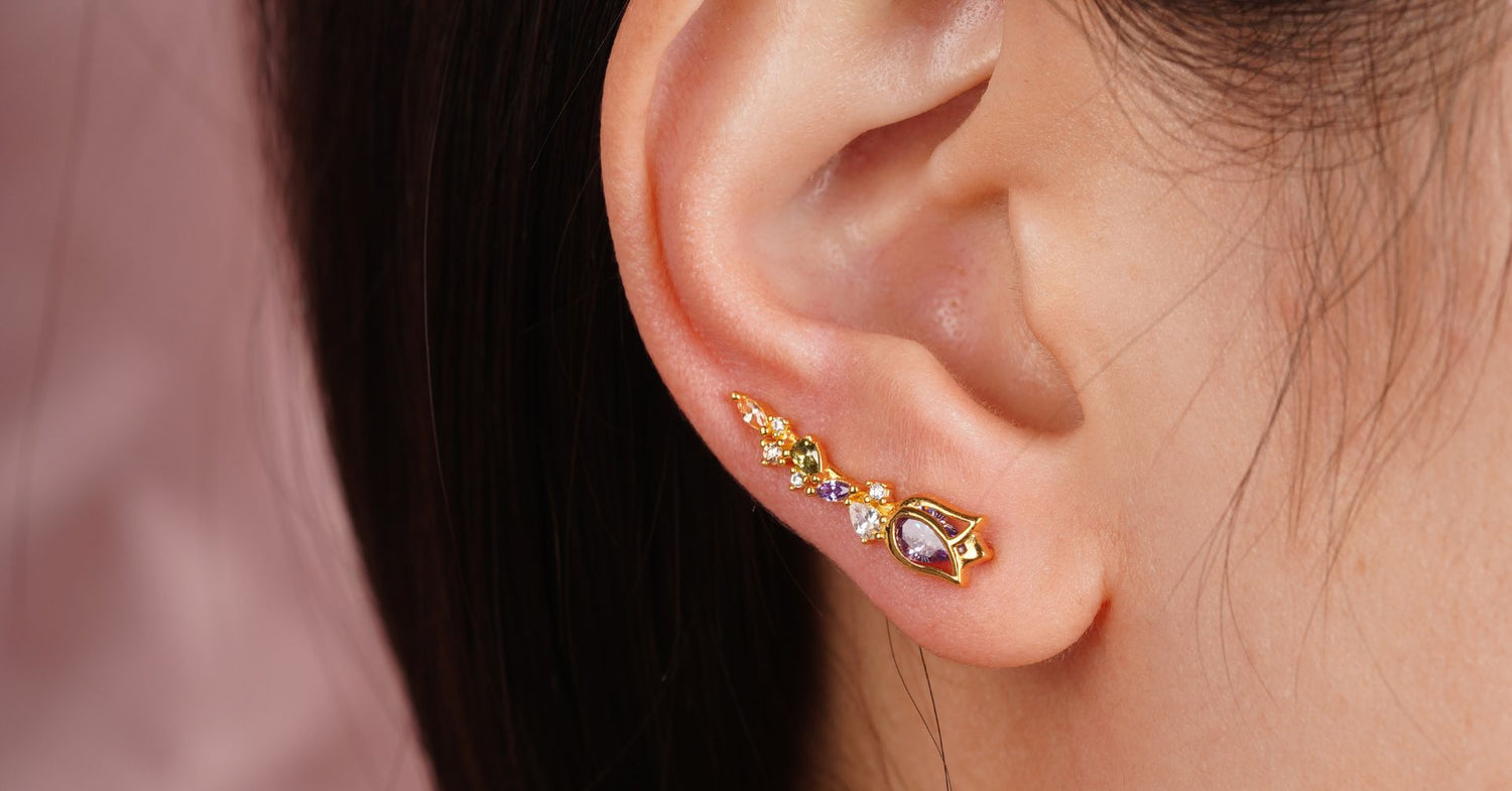 Boucles d'oreilles grimpantes en or jaune - un accessoire élégant et tendance