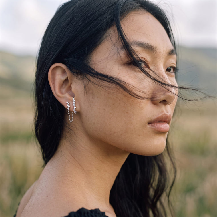 Boucle d'oreille Brise en argent portée, Les Joyaux d'Auré