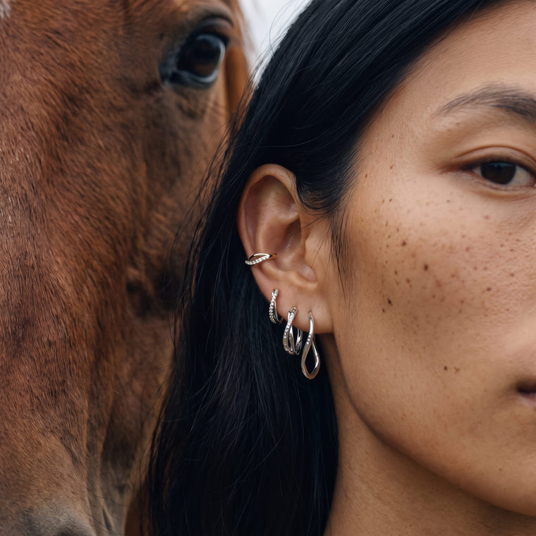 Boucle d'oreille Eclat en argent portée, Les Joyaux d'Auré
