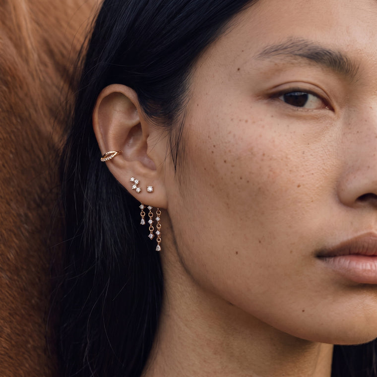 Boucle d'oreille Pollen en or rose portée, Les Joyaux d'Auré